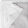 A close-up view of a white, fluffy blanket folded over itself. Produktbild-Vorschau