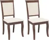 Two dining chairs with cream-colored seats and backs, and dark brown wooden frames, are shown against a white background. Produktbild-Vorschau