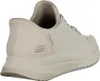 A side view of a white Skechers sneaker. Voir les images du produit