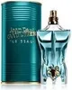 A bottle of Jean Paul Gaultier Le Beau Eau de Toilette and its matching cylindrical tin. Voir les images du produit