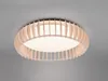 A close-up, slightly angled view of a round, beige wooden ceiling light fixture mounted on a light gray ceiling. Náhľad obrázku produktu