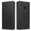A black leather flip phone case is shown from two angles. Produktbild-Vorschau