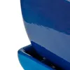 A close-up view of a blue ceramic planter with a saucer. Náhled obrázku produktu