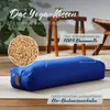 A blue yoga bolster is shown on a yoga mat with text overlays describing its features and materials. Produktbild-Vorschau