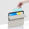 A hand is holding a stylus above a tablet in a clear case with a folded cover. Anteprima dell’immagine prodotto