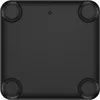 The underside of a black electronic device with four circular rubber feet. Náhľad obrázku produktu