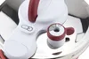 A close-up view of the lid of a pressure cooker, showing the handle, control dial, and part of the stainless steel pot. Produktbild-Vorschau