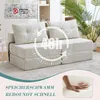 A beige sofa bed is shown in a living room setting with a plant in the background. Overlay graphics indicate features. Náhled obrázku produktu