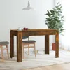 A dining table with two chairs in a room with a plant and a pendant lamp. Produktbild-Vorschau