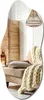 A mirror reflecting a cozy living room scene with a chair, blanket, and lamp. Produktbild-Vorschau