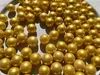 Detailansicht hochwertiger goldener Glasmurmeln aus Glas mit intensiver Farbe und Glanz. Produktbild-Vorschau