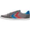 A side view of a single sneaker against a white background. Produktbild-Vorschau