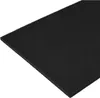 A black foam insert with a base plate, shown from an angle on a white background. Produktbild-Vorschau