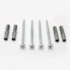 A set of screws and wall plugs on a white background. Podgląd zdjęcia produktu