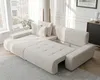 A beige sectional sofa with a pull-out bed feature is shown in a well-lit living room. Produktbild-Vorschau