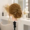 Tête à coiffer Ela - Cheveux naturels 60 cm avec trépied Voir les images du produit 9