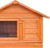 A close-up view of the top section of a wooden rabbit hutch. Náhľad obrázku produktu