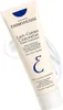 A tube of Embryolisse Lait-Crème Concentré moisturizer is shown against a white background with a clear liquid splash behind it. Anteprima dell’immagine prodotto