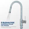 A diagram showing water flow through a kitchen faucet, highlighting its lead-free water channels. Produktbild-Vorschau