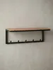 Kompakte Wandgarderobe aus Akazie Massivholz als Gesamtübersicht. Das funktionale Design mit Hakenleiste und Ablage für den Eingangsbereich._#sku_SAFWL6.354# Produktbild-Vorschau