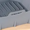 A close-up view of a gray silicone air fryer liner with a handle. Náhľad obrázku produktu