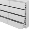 A close-up view of a white dresser with multiple drawers, some of which are partially open, revealing the drawer slides. Voir les images du produit