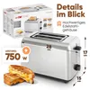 A marketing image showing a Clatronic toaster with its packaging and some grilled cheese sandwiches. Produktbild-Vorschau