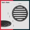 A diagram showing a round grate with dimensions and a smaller view of the grate. Anteprima dell’immagine prodotto