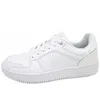 A white Champion Rebound 2.0 Low sneaker is shown from the side against a white background. Podgląd zdjęcia produktu