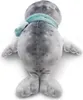 A plush toy seal wearing a scarf, shown from the back. Produktbild-Vorschau