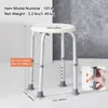 A white shower stool with adjustable legs is shown against a light gray textured wall and a white floor. Produktbild-Vorschau
