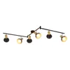 A black track light fixture with six adjustable spotlights, each with a wooden accent, against a white background. Voir les images du produit