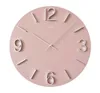 A pink wall clock with silver numbers and hands, presented against a white background. Produktbild-Vorschau
