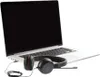 A laptop computer with headphones placed in front of it. Voir les images du produit