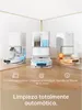 Three robotic vacuum cleaners with docking stations are displayed in a modern setting. Náhled obrázku produktu