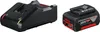 A black battery charger and a black and red battery pack are shown against a white background. Voir les images du produit