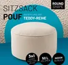 A beige round pouf is shown against a textured background and a teal circle overlay with text. Podgląd zdjęcia produktu