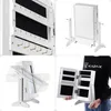 A collage of images showing a white jewelry box with a mirror, its interior compartments, and a person holding it. Produktbild-Vorschau