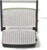An open panini press with ribbed grill plates. Produktbild-Vorschau