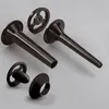 A set of black meat grinder attachments on a light gray background. Podgląd zdjęcia produktu