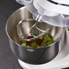 A close-up shot of a stand mixer bowl with ingredients being mixed. Produktbild-Vorschau