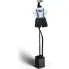 A children's outfit consisting of a white shirt, black and white striped shorts, and suspenders, displayed on a garment steamer. Produktbild-Vorschau