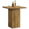 A square bar table with a wooden finish and a thick pedestal base, featuring two bottles of whiskey and two glasses on top. Produktbild-Vorschau