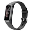 A close-up studio shot of a black smartwatch with a gray band against a white background. Náhled obrázku produktu