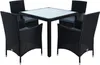 A black polyrattan dining set with a glass tabletop, consisting of a square table and four chairs, is shown against a white background. Produktbild-Vorschau