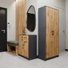 A hallway with a shoe bench, cabinet, and tall storage unit. Produktbild-Vorschau