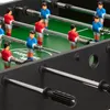 A close-up view of a foosball table with red and blue player figures on silver rods. Anteprima dell’immagine prodotto