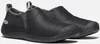 A pair of black slip-on shoes shown from a slightly elevated side angle against a white background. Produktbild-Vorschau
