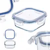 Several glass food storage containers with blue lids are displayed against a white background. Anteprima dell’immagine prodotto
