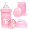 A pink Twistshake baby bottle and its accessories are displayed against a white background. Podgląd zdjęcia produktu